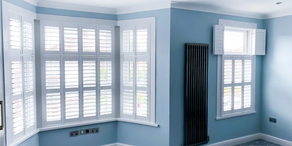 Tier on tier shutters with a midrail